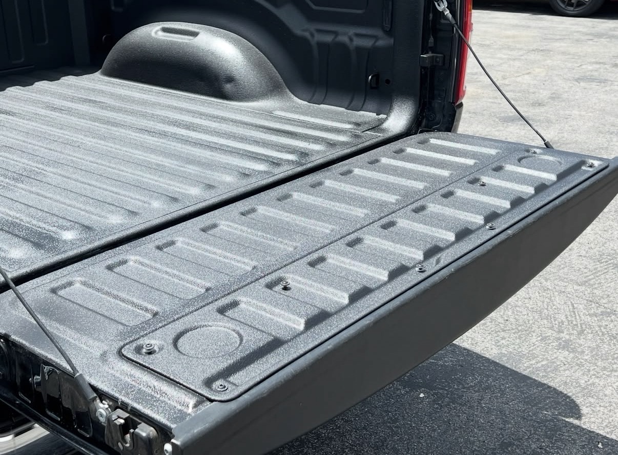 Truck tailgate after spray-in bedliner