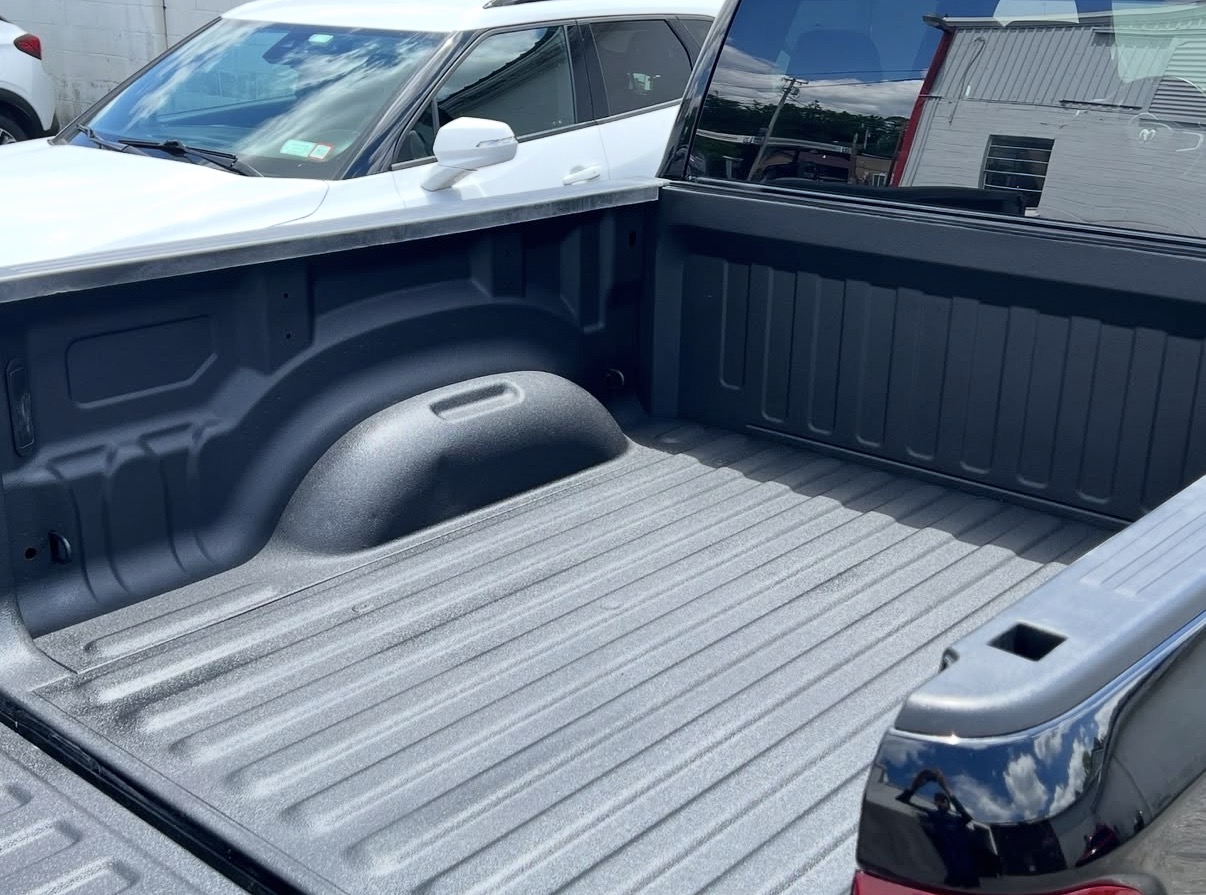 Truck bed after spray-in bedliner angled view