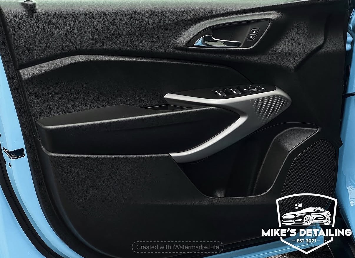 Blue Chevrolet Trax cleaned door panel