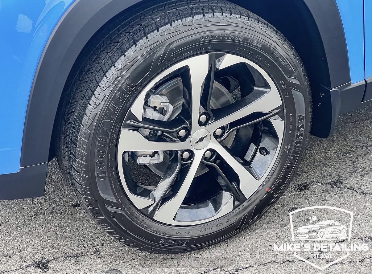 Blue Chevrolet Trax cleaned wheel and tire