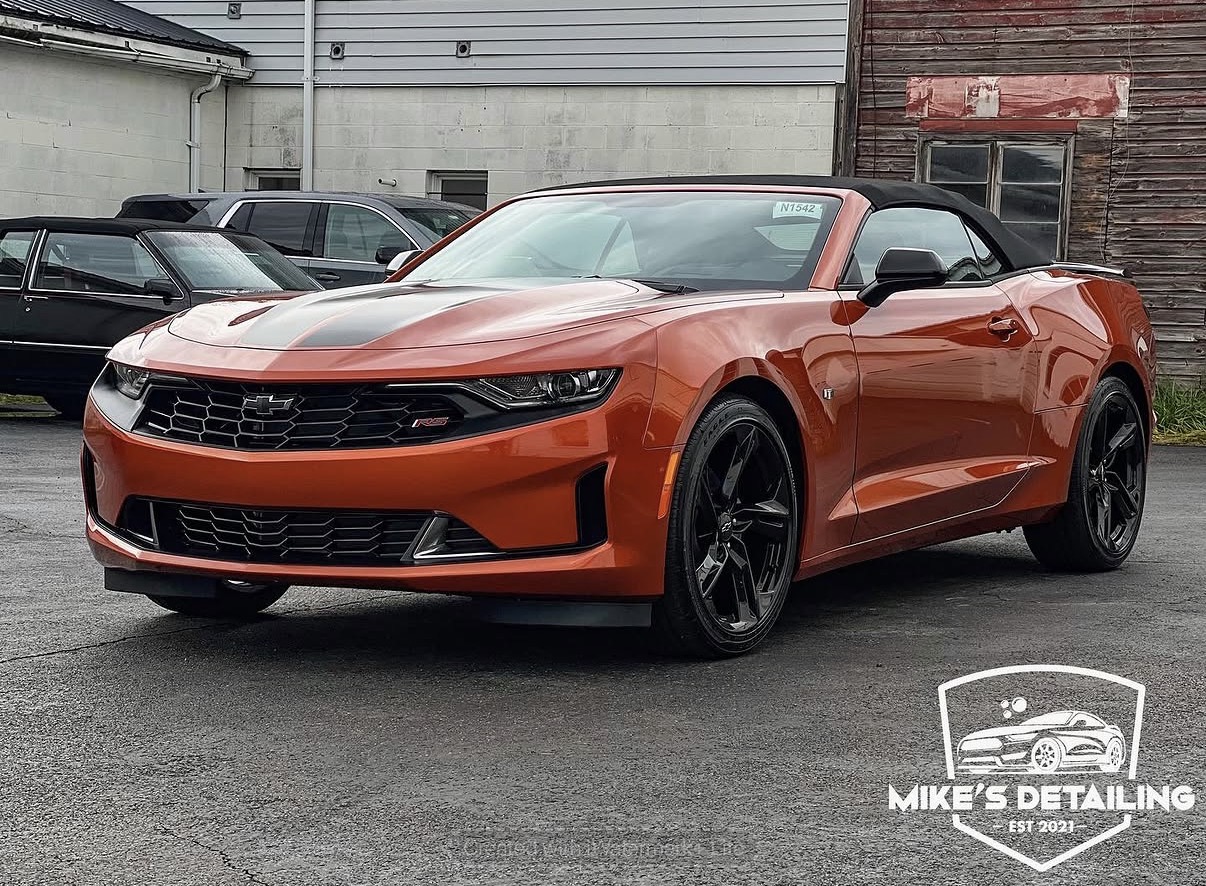 Orange Chevrolet Camaro full exterior after detail