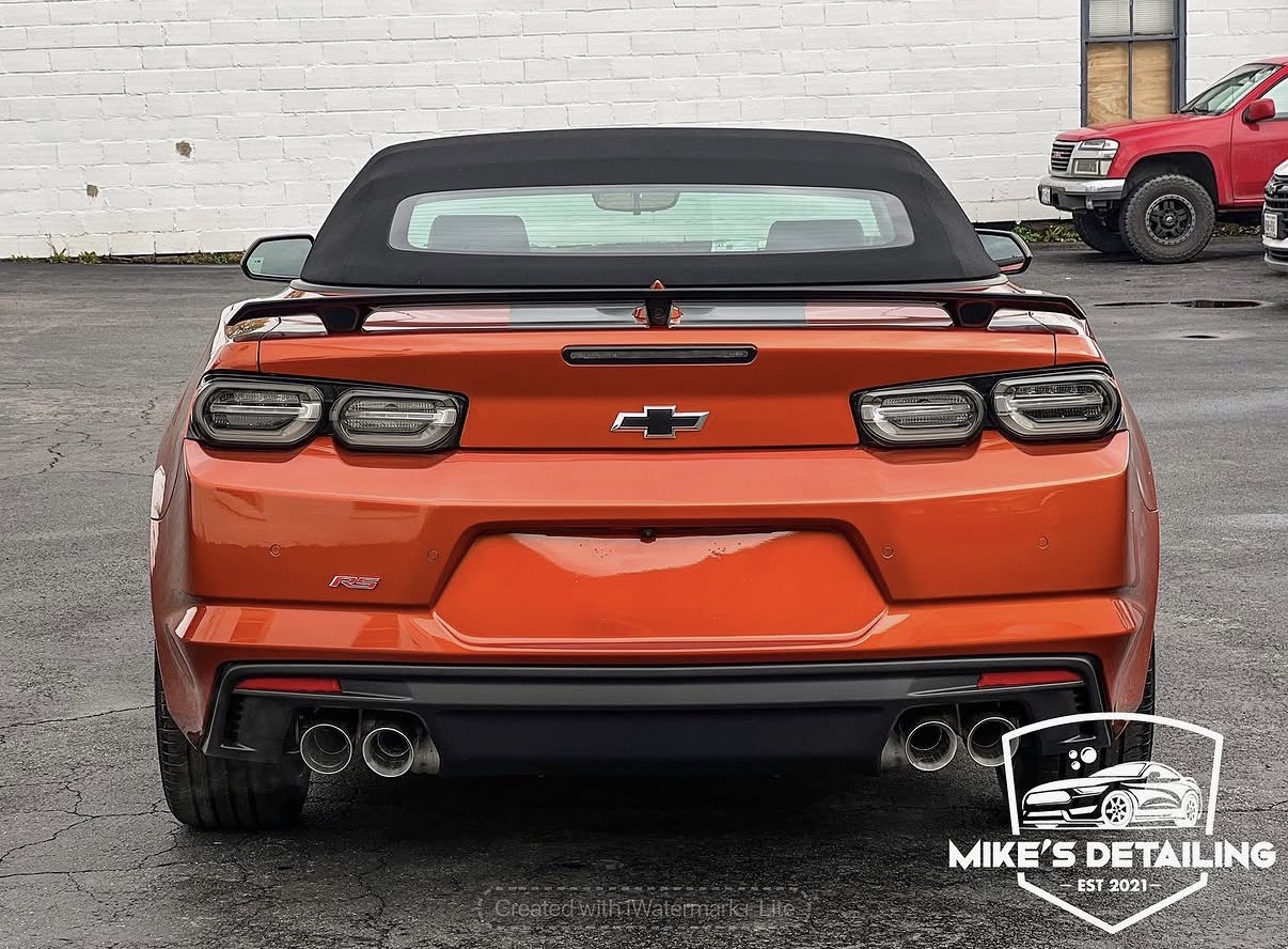 Orange Chevrolet Camaro rear after exterior detail
