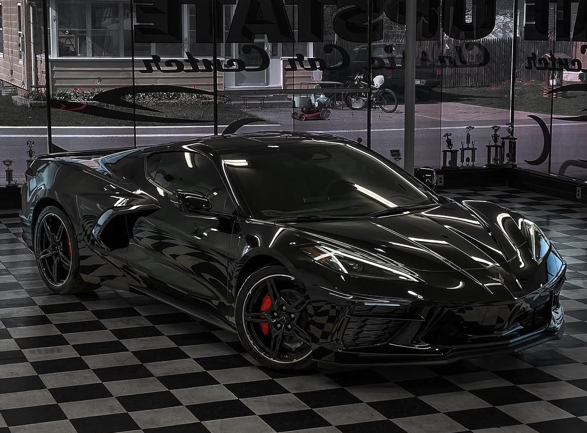 Black Corvette polished inside Mike's Detailing shop