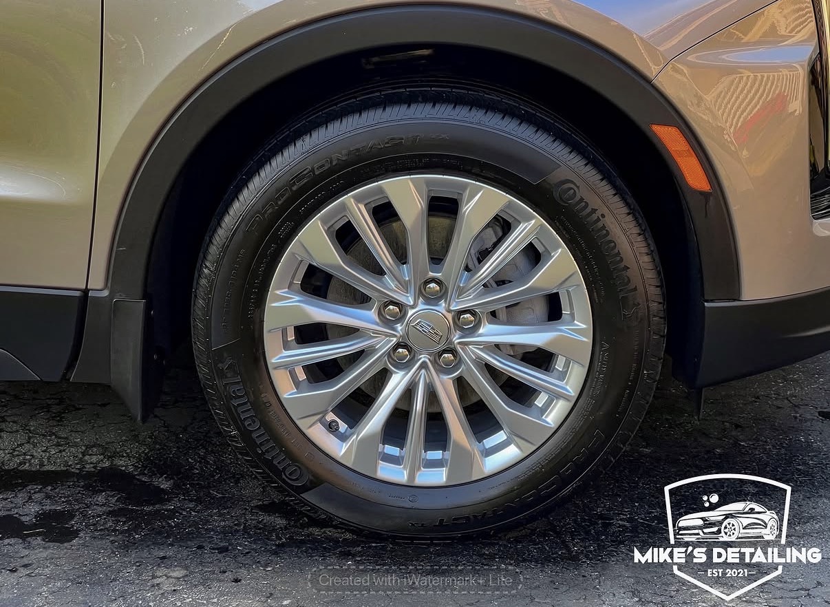 Detailed polished wheel and tire close-up