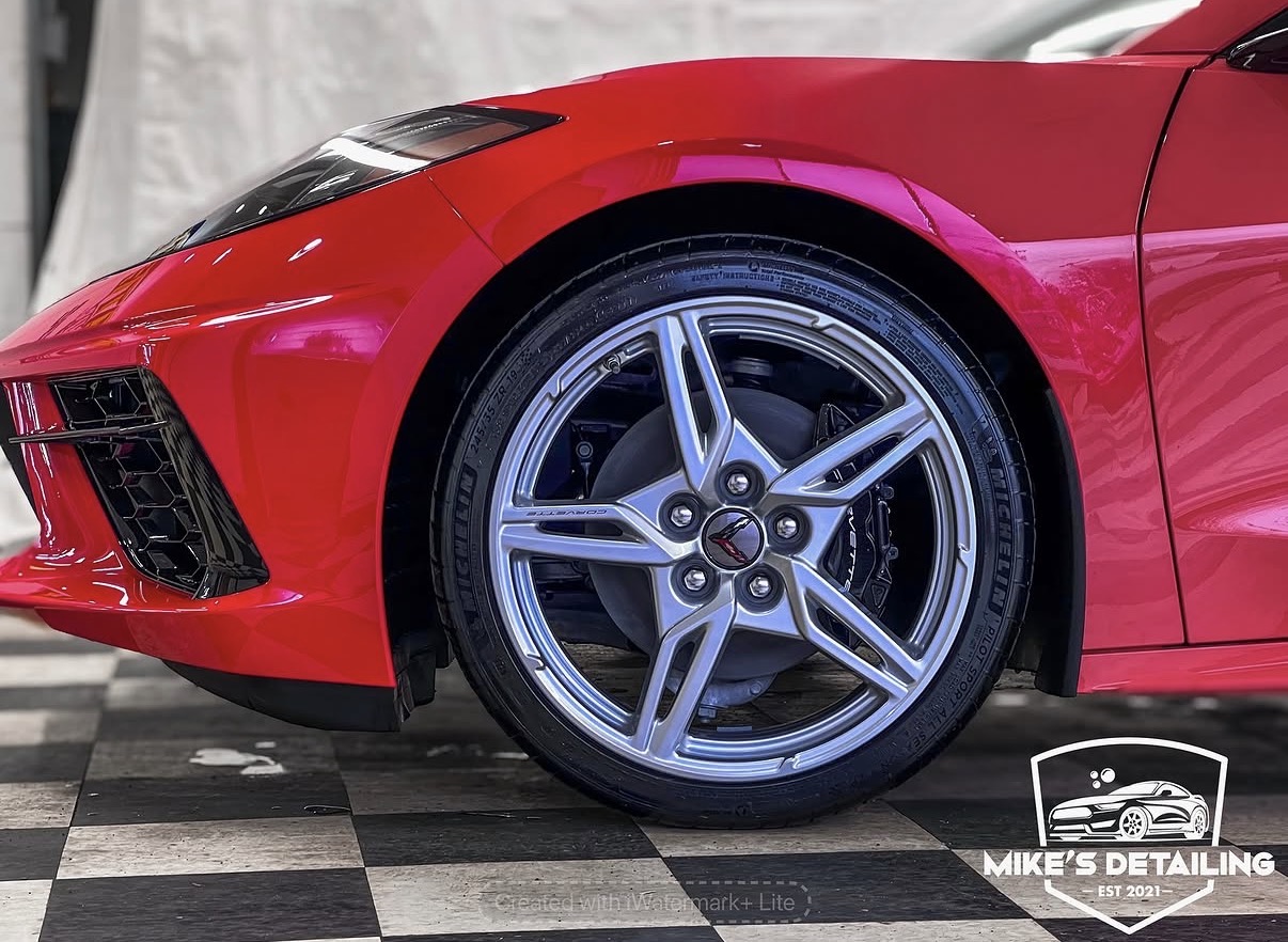 Red Corvette wheel and tire detail