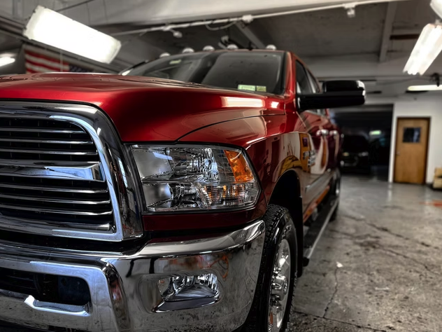 Red Ram truck detailed with glossy chrome finish