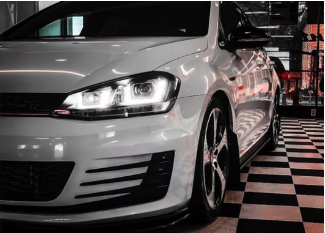 White Volkswagen GTI front end after detailing