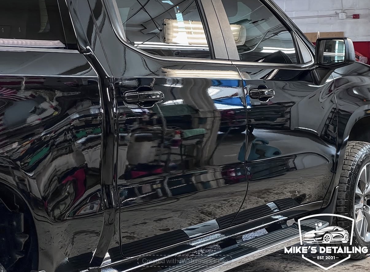 Black truck after paint correction full side gloss